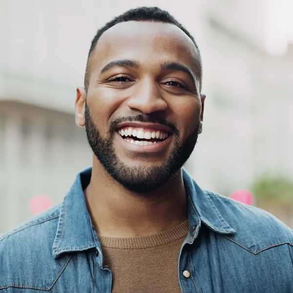 young adult man smiling