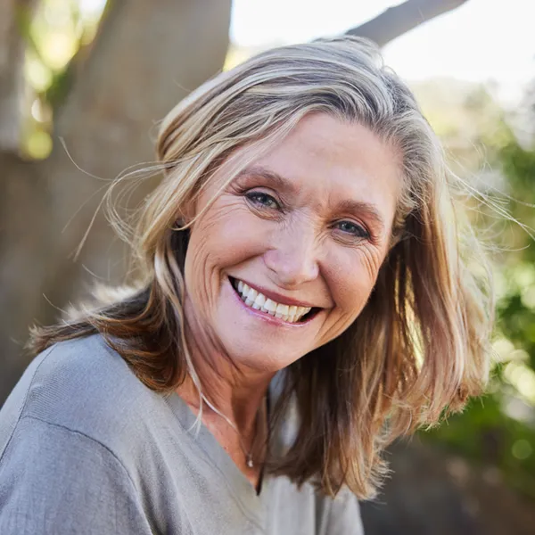 mature woman with perfect teeth, smiling