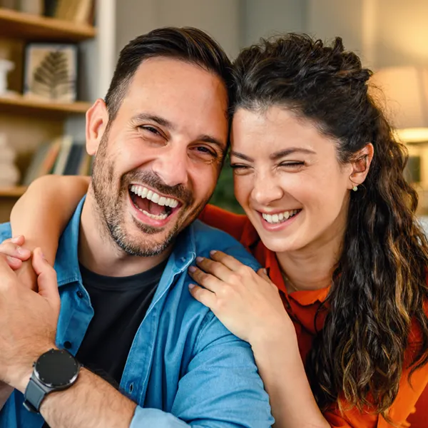 adult couple smiling and laughing