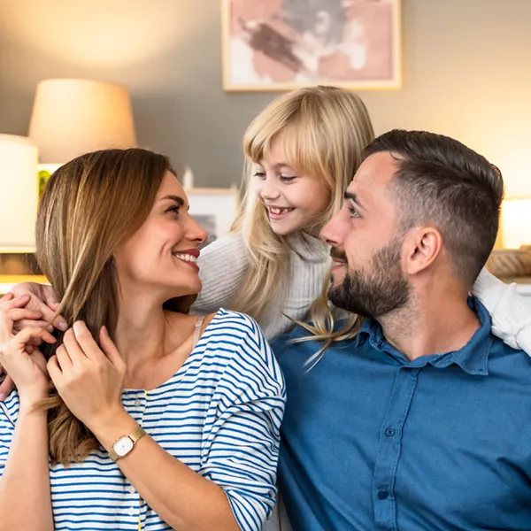 young family on their couch