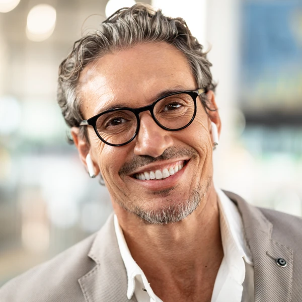 Close-up portrait of a happy mature businessman