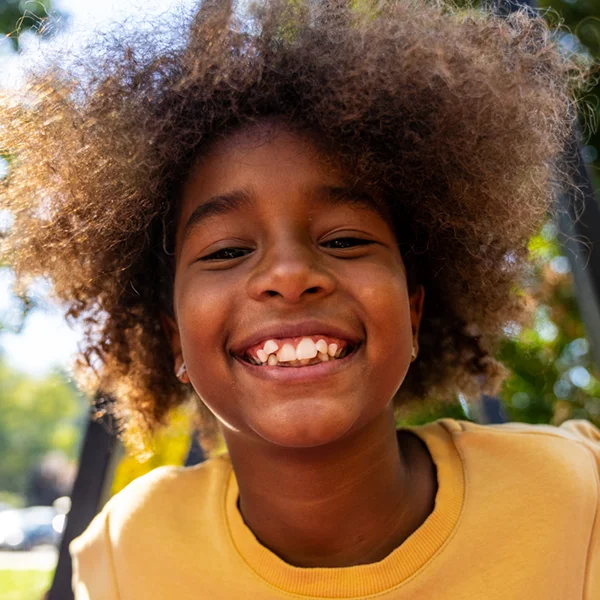 young boy smiling